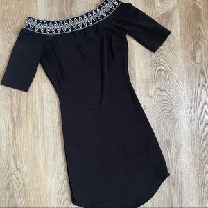 gLARE | body con off the shoulder mini little black dress